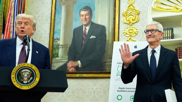 U s president donald trump and apple ceo tim cook in the oval office together.jpg.