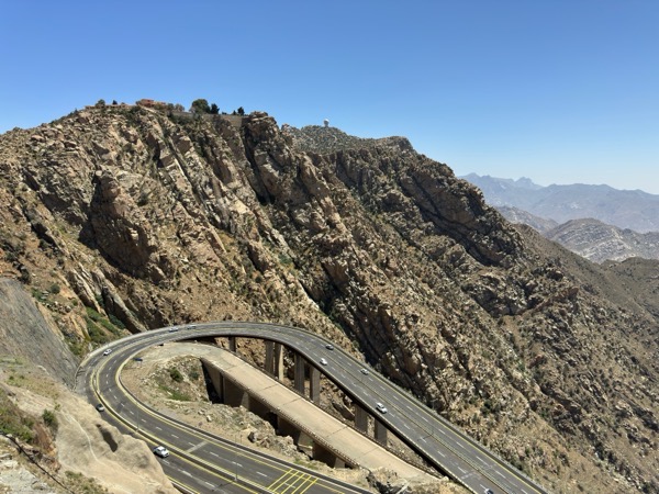 A high curving road in the mountains. Photo by ARRitz on Shutterstock