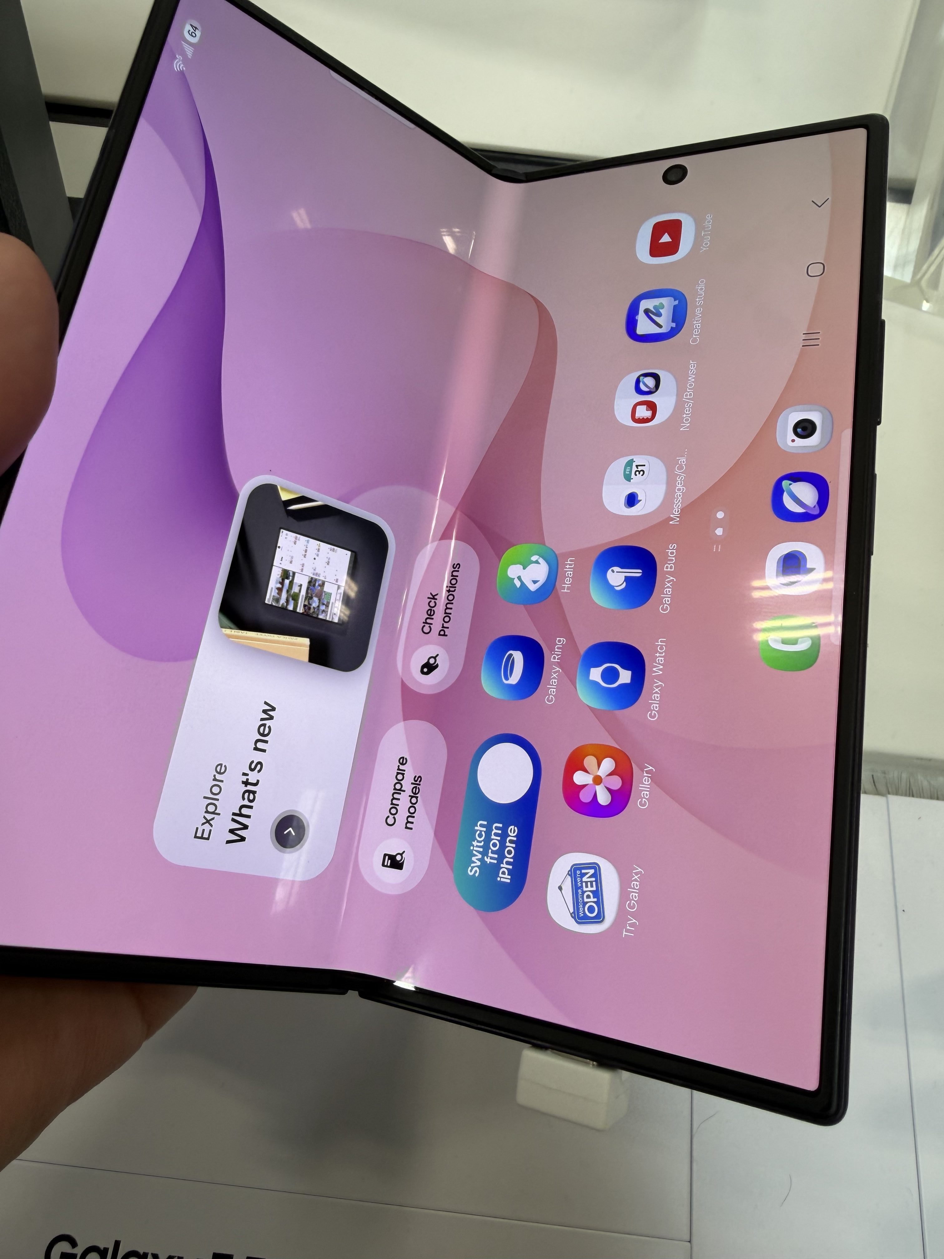The Galaxy Z Fold 8 Ultra in partially open position with the screen rotated into landscape mode